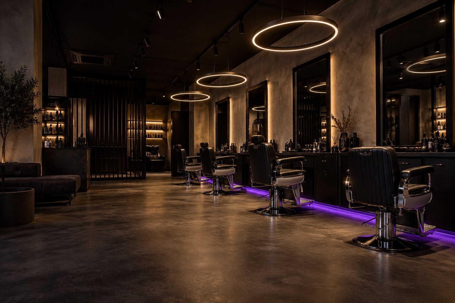Interieur van FV Barbershop met barberstoelen, spiegels en ringlampen
